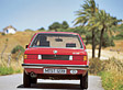 BMW 316 Baujahr 1978 - in einer damals noch beliebten Farbe: Rot. Heckansicht.