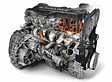 Der Aluminium-Zylinderkopf beinhaltet jeweils vier Ventile pro Zylinder. Der Motor besitzt die variable Nockenwellensteuerung Ti-VCT.