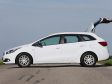 Kia Ceed SW - Seitenansicht mit offener Heckklappe